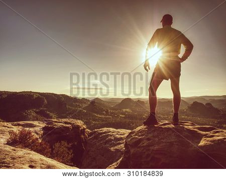 Silhouette Of Athlete Runner On Sunset Background Copy Space. Sportsman Jogging In Evening Catching 