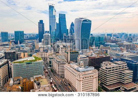 Arial View Of London With The River Thames Floating Through The City Near The Tower Bridge, London C