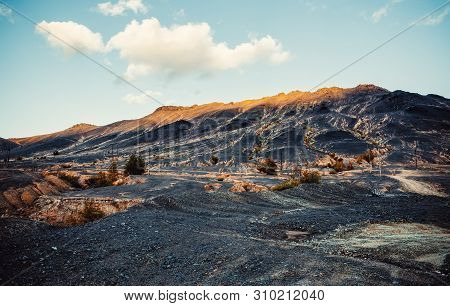 Scorched Waste Copper Production Soil And Mountains Of Waste Near Plant Environmental Disaster