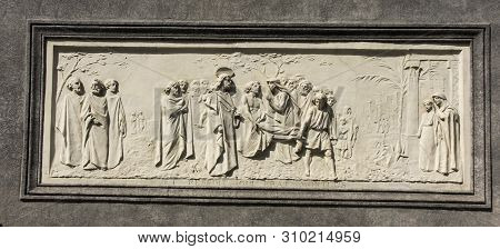 Turin, Italy, June 27, 2019:  Bas-relief From The Facade Of The Church Of Our Lady Help Of Christian