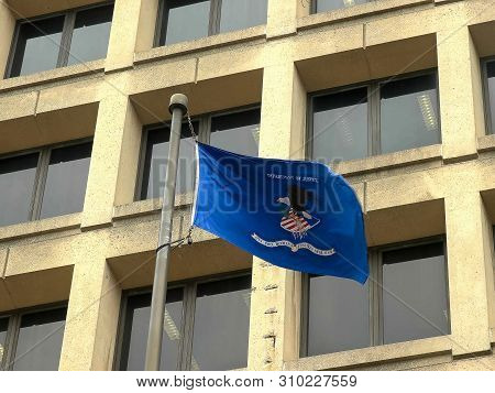 Close Up Of The Department Of Justice Flag On The Fbi Building In D.c.