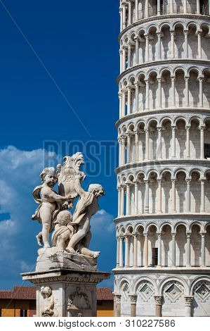 Fontana Dei Putti And The Leaning Tower Of Pisa
