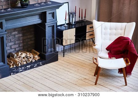 Beautiful Living Room Interior With Hardwood Floors And Fireplace In New Luxury Home.