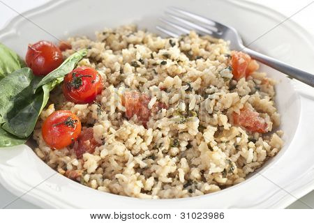 Risotto z pomidorami i szpinakiem