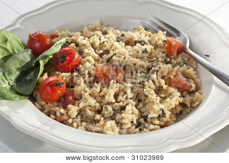 Risotto z pomidorami i szpinakiem