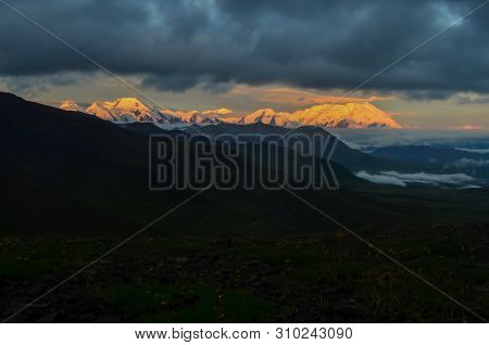 Sunrise View Of Mount Denali - Mt Mckinley Peak With Alpenglow During Golden Hour From Stony Dome Ov