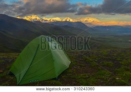 Sunrise View Of Mount Denali - Mt Mckinley Peak With Alpenglow During Golden Hour With Green Camping