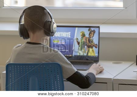 Vilnius, Lithuania - March 2, 2019: Child Playing Fortnite Game. Fortnite Is Popular Online Video Ga