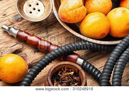 Smoking Arab Hookah With Apricots