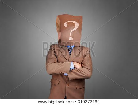 Portrait Of Businessman In Disguise, Wearing Blank Empty Paper Bag Mask Covering His Face With Quest