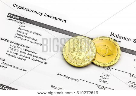 Still Life Of Cryptocurrency Investment. Bitcoin And Ethereum Souvenir Coins Layed Out On An Investm