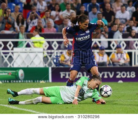 Kyiv, Ukraine - May 24, 2018: Amel Majri Of Olympique Lyonnais (up) Fights For A Ball With Ewa Pajor