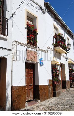 Ronda, Spain - May 5, 2008 - View Along A Traditional Spanish Town Centre Street With A Small Candy 