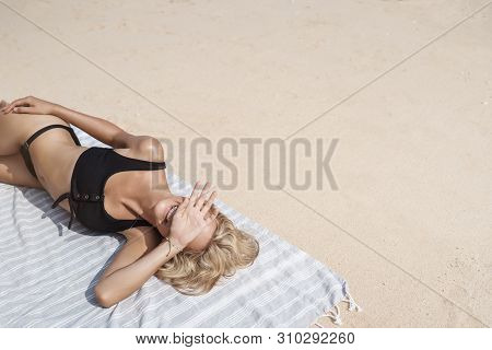 Happiness, Tourism, Vacation Concept. Carefree Delighted Tanned Blond Young Woman Lie Down Sandy Bea