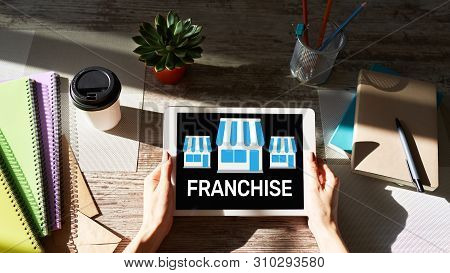 Franchise Business Model And Growth Concept On Device Screen.