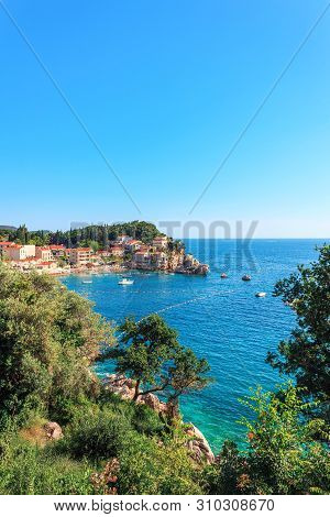 Picturesque Summer View Of Adriatic Sea Coast In Budva Riviera. Przno Village With Buildings On The 