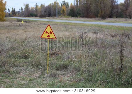 Radiation Sign On A Graveyard In Abandoned Pripyat City In Chernobyl Exclusion Zone, Ukraine