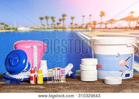 Equipment With Chemical Cleaning Products And Tools For The Maintenance Of The Swimming Pool.