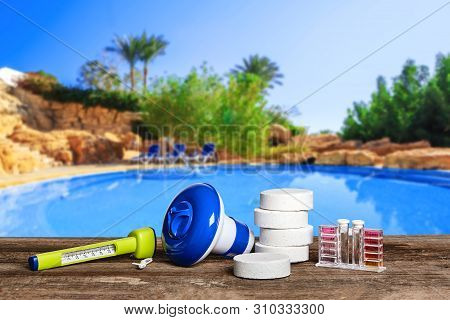 Equipment With Chemical Cleaning Products And Tools For The Maintenance Of The Swimming Pool.