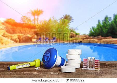 Equipment With Chemical Cleaning Products And Tools For The Maintenance Of The Swimming Pool.
