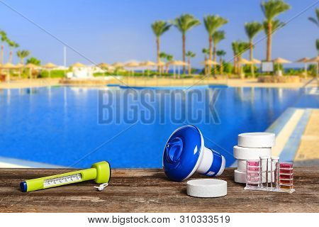 Equipment With Chemical Cleaning Products And Tools For The Maintenance Of The Swimming Pool.