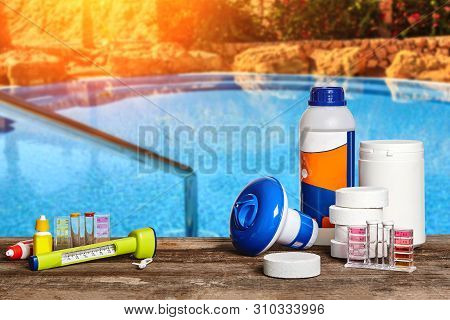 Equipment With Chemical Cleaning Products And Tools For The Maintenance Of The Swimming Pool.