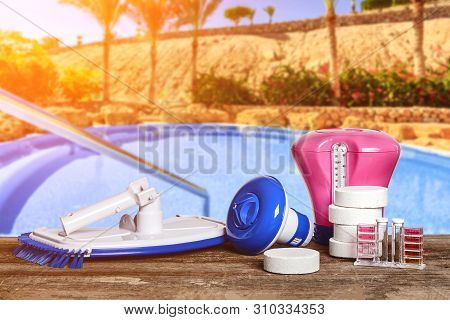 Equipment With Chemical Cleaning Products And Tools For The Maintenance Of The Swimming Pool.