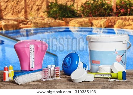 Equipment With Chemical Cleaning Products And Tools For The Maintenance Of The Swimming Pool.