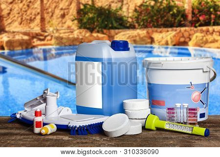 Equipment With Chemical Cleaning Products And Tools For The Maintenance Of The Swimming Pool.
