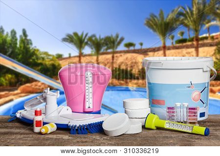 Equipment With Chemical Cleaning Products And Tools For The Maintenance Of The Swimming Pool.