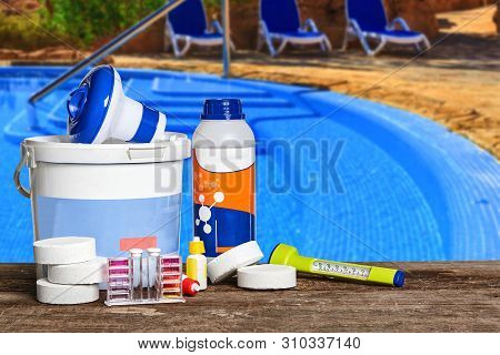 Equipment With Chemical Cleaning Products And Tools For The Maintenance Of The Swimming Pool.