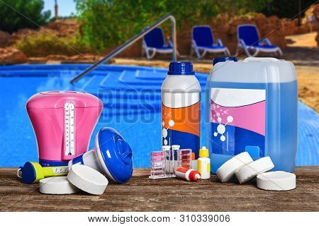Equipment With Chemical Cleaning Products And Tools For The Maintenance Of The Swimming Pool.