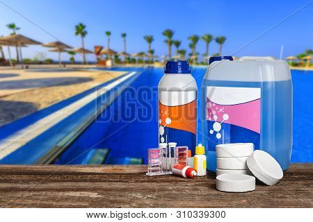 Equipment With Chemical Cleaning Products And Tools For The Maintenance Of The Swimming Pool.