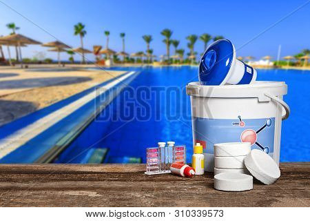 Equipment With Chemical Cleaning Products And Tools For The Maintenance Of The Swimming Pool.