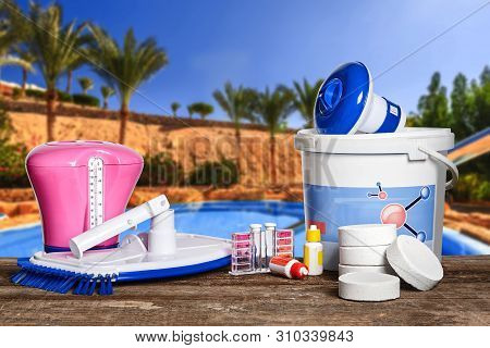 Equipment With Chemical Cleaning Products And Tools For The Maintenance Of The Swimming Pool.