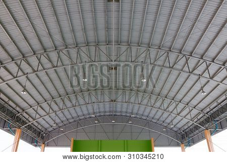 Steel Roof Structure. Moonlight Bulb. Steel Structure With Roof Tiles. Architectural Structure Of Ro