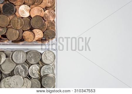 Organized Loose Coin Change On Left Side, Blank Empty Room Space For Text Right