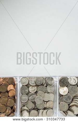 Organized Loose Coin Change On Bottom Side, Blank Empty Room Space For Text Top
