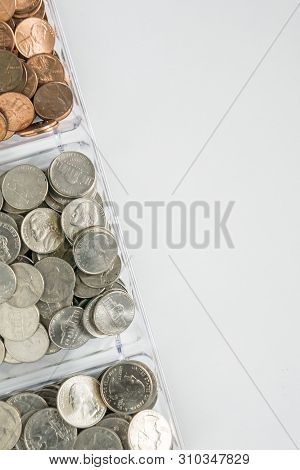 Organized Loose Coin Change On Left Side, Blank Empty Room Space For Text Right