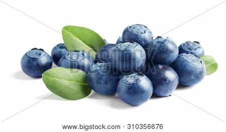 Fresh Raw Tasty Blueberries With Leaves Isolated On White