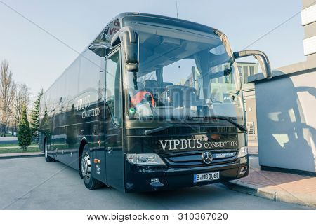 RUSSIA, KALININGRAD KOENIGSBERG -APRIL 13, 2019 : Modern Black Passenger Bus on the Parking Lot