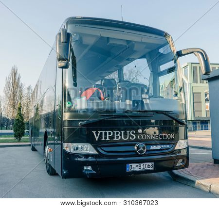 RUSSIA, KALININGRAD KOENIGSBERG -APRIL 13, 2019 : Modern Black Passenger Bus on the Parking Lot