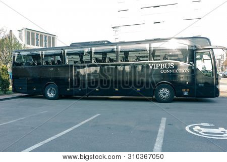 RUSSIA, KALININGRAD KOENIGSBERG -APRIL 13, 2019 : Modern Black Passenger Bus on the Parking Lot