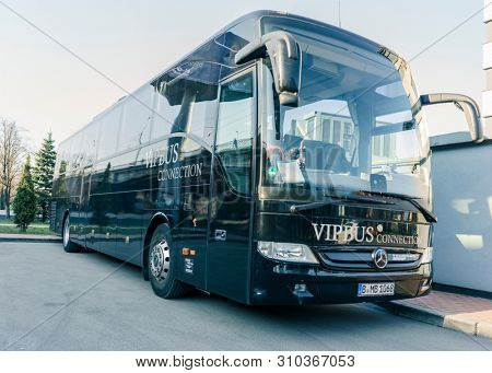 RUSSIA, KALININGRAD KOENIGSBERG -APRIL 13, 2019 : Modern Black Passenger Bus on the Parking Lot