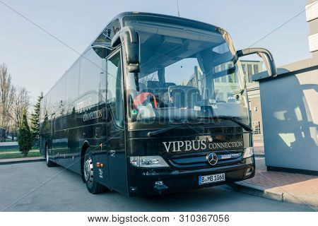 RUSSIA, KALININGRAD KOENIGSBERG -APRIL 13, 2019 : Modern Black Passenger Bus on the Parking Lot