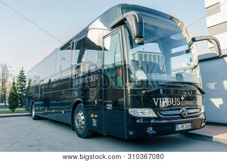 RUSSIA, KALININGRAD KOENIGSBERG -APRIL 13, 2019 : Modern Black Passenger Bus on the Parking Lot