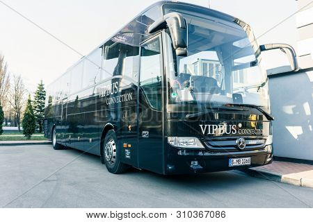 RUSSIA, KALININGRAD KOENIGSBERG -APRIL 13, 2019 : Modern Black Passenger Bus on the Parking Lot