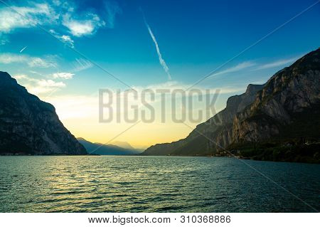 Idyllic Sunset Over Lake Como And Monutains Taken From Lecco City, Lombardy, Italy
