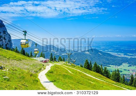 View On Yellow Cable Car At Kampenwand In Bavaria, Germany