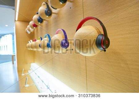 COLOGNE, GERMANY - CIRCA OCTOBER, 2018: Beats headphones on display at Apple store in Cologne. 
